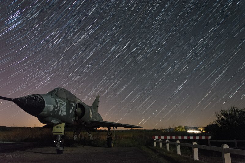 Aircraft under Star Trails