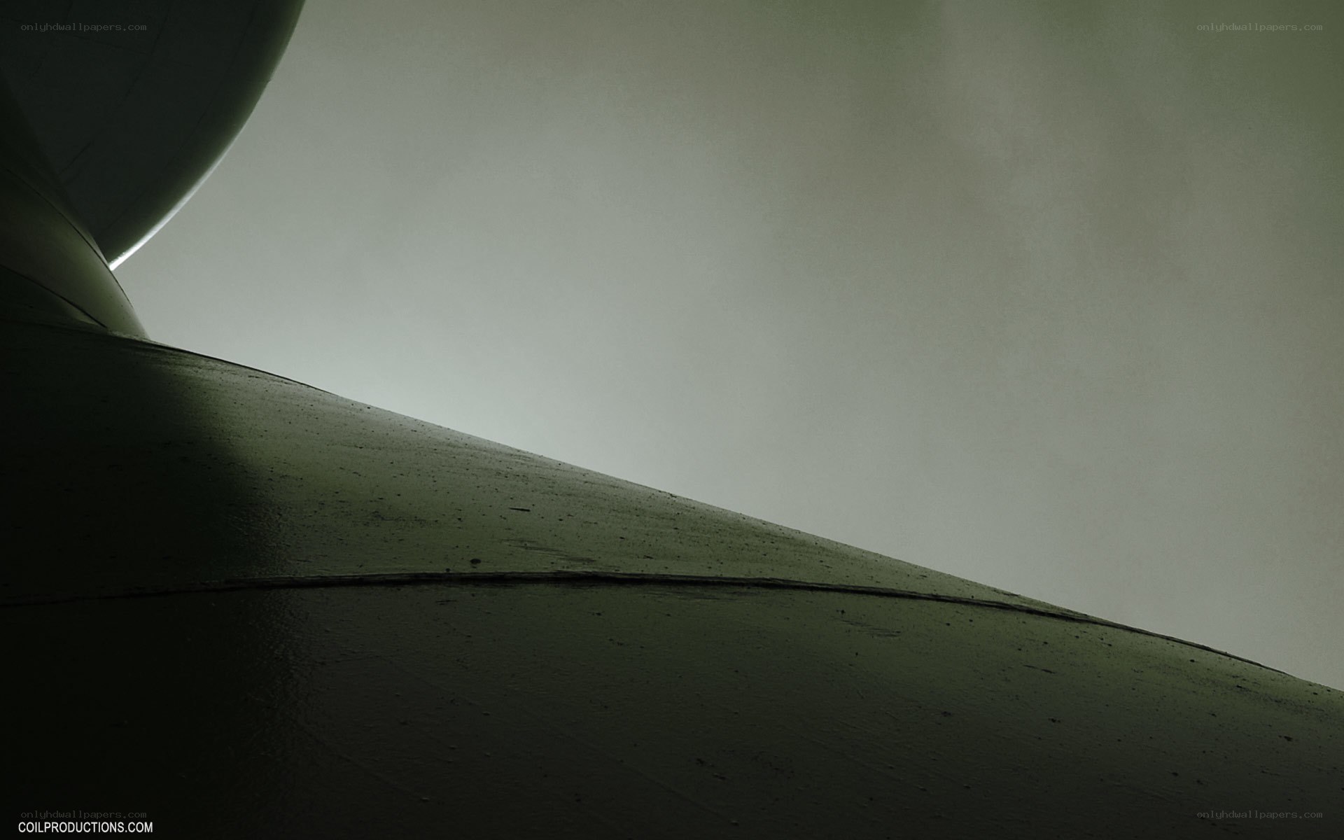 aircraft wing in cloudy sky