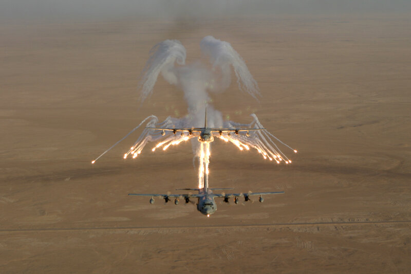 Aircraft with flares in desert
