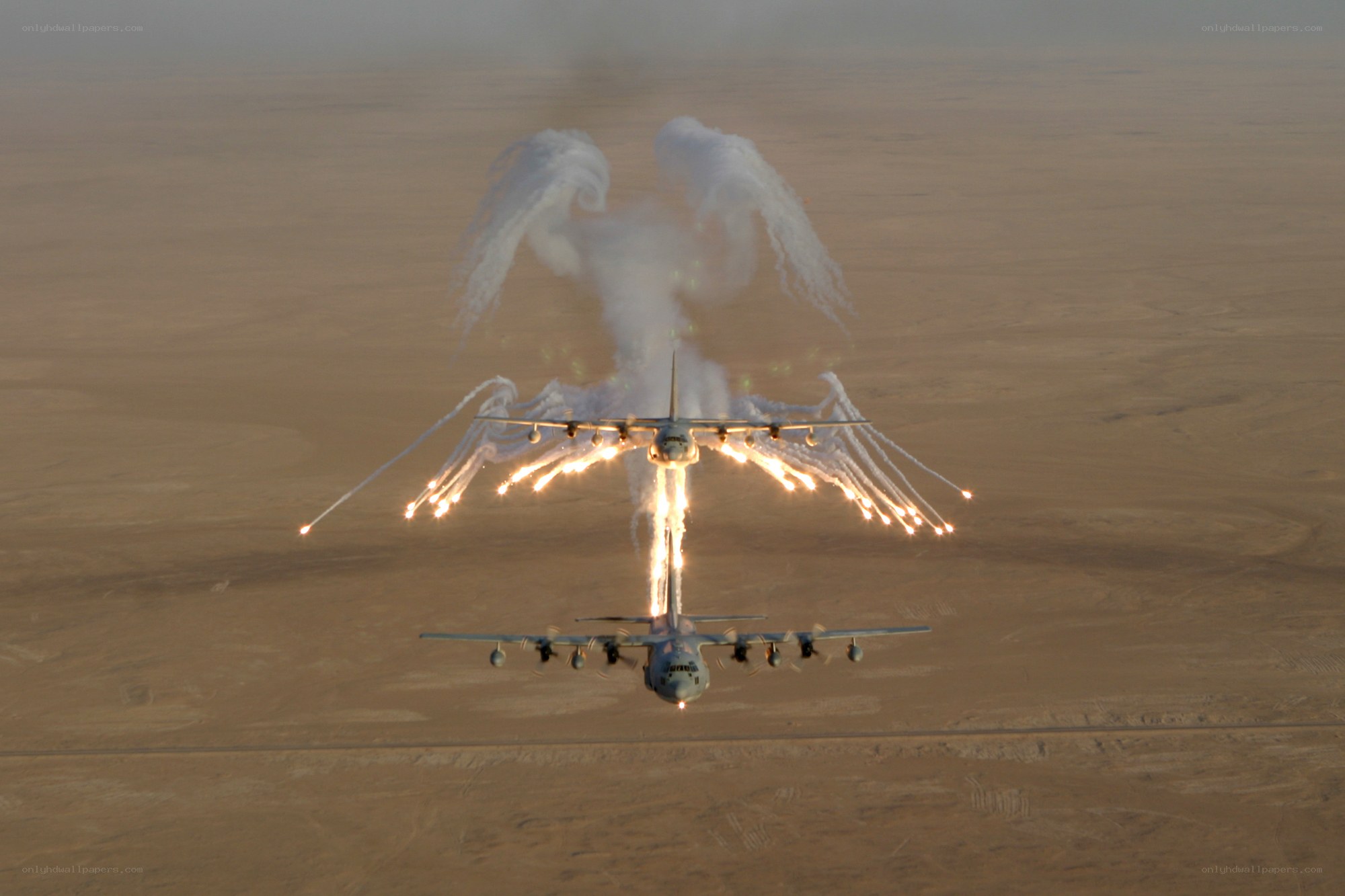 Aircraft with flares in desert