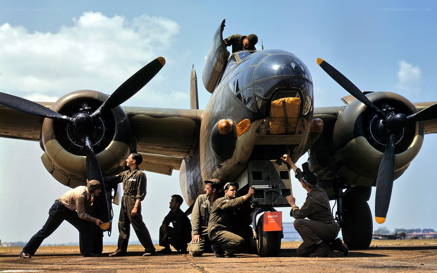 Aircrew servicing a bomber