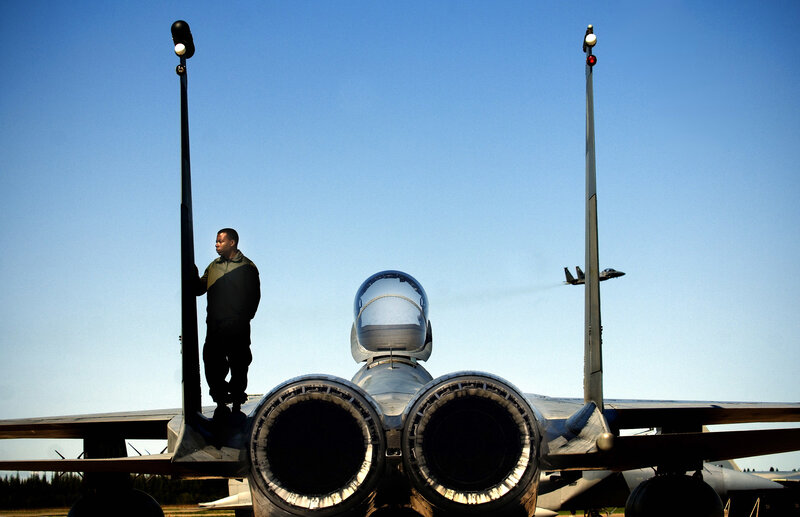 Airman near fighter jet