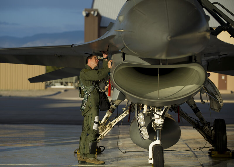 Airman with Fighter Jet