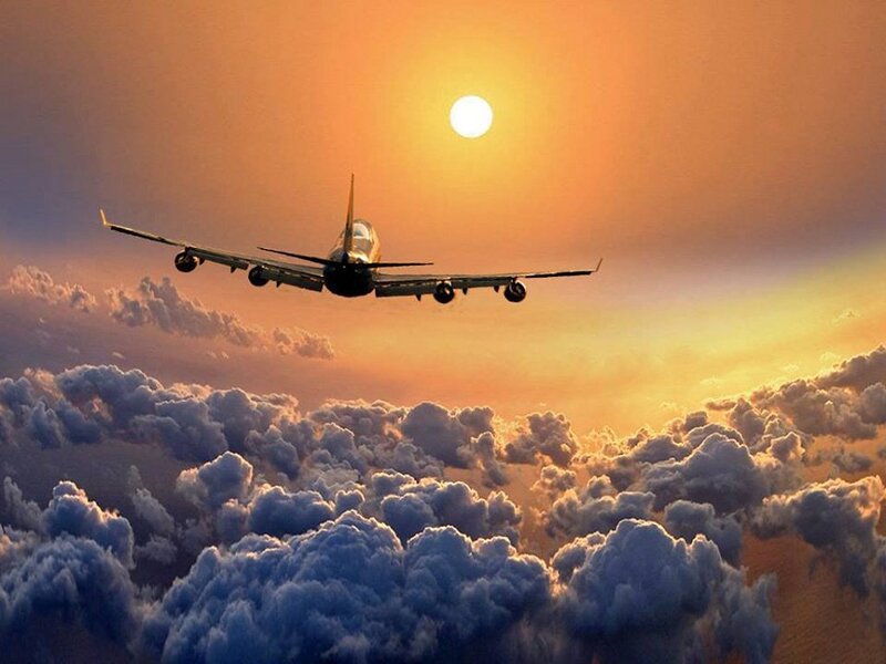 Airplane Above Clouds — Orange, Dramatic