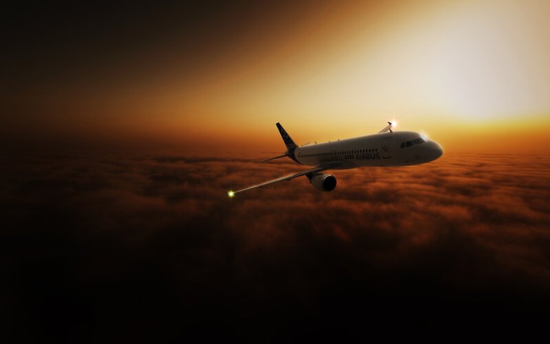 Airplane Above Clouds — Orange
