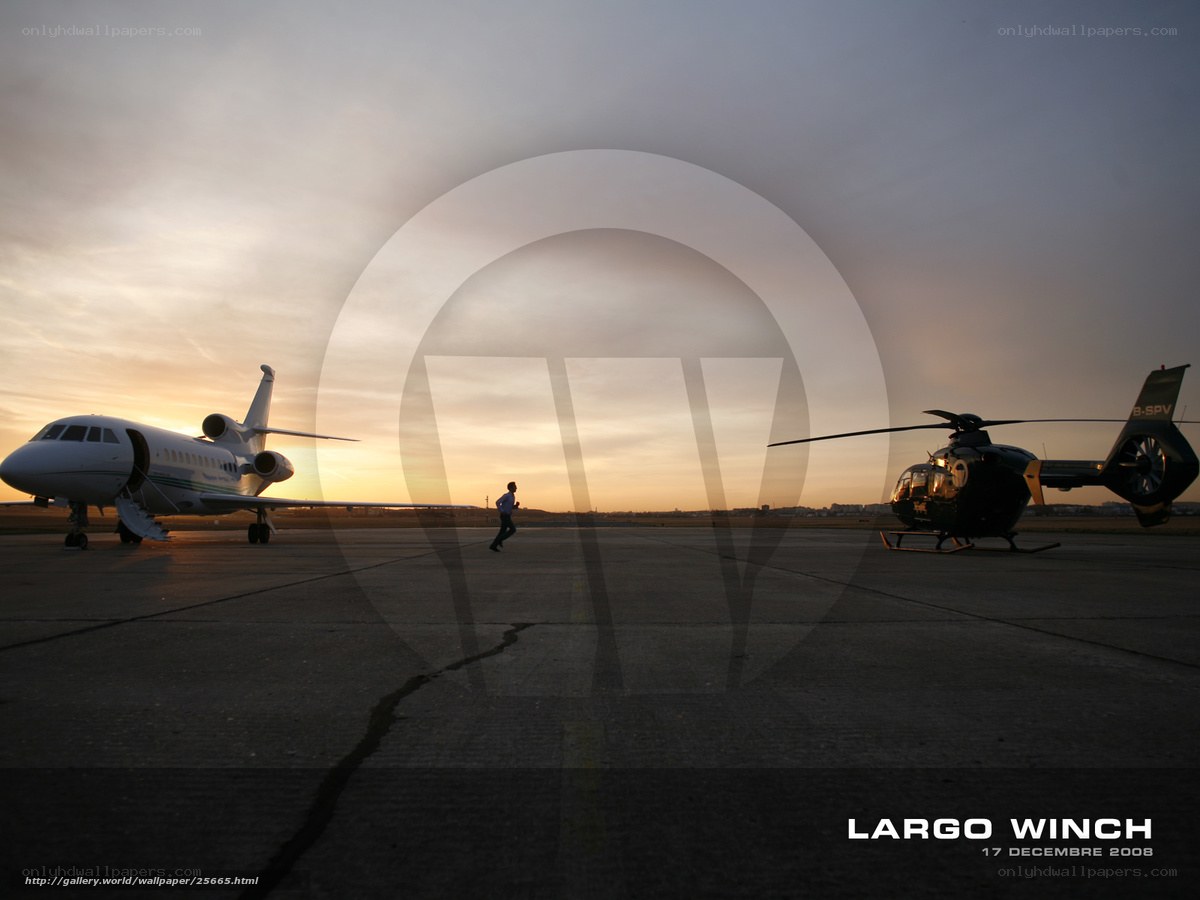 Airplane and helicopter at sunset
