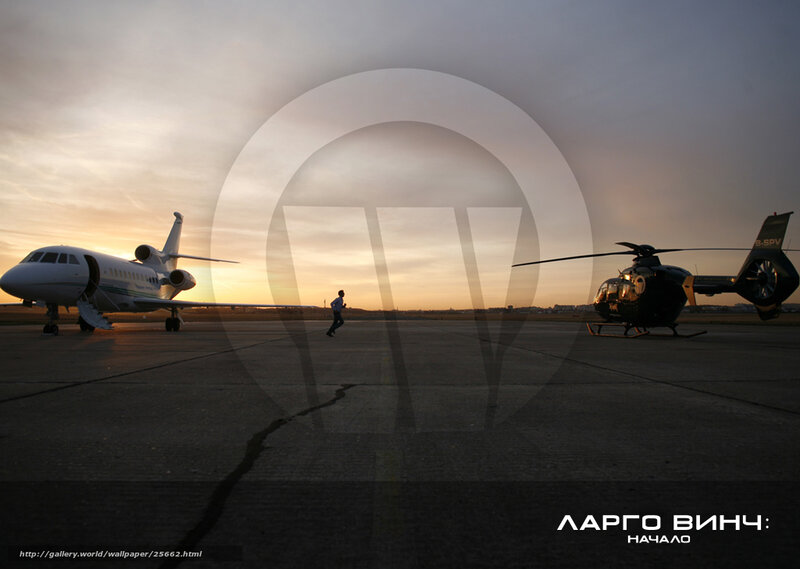 Airplane and helicopter at sunset