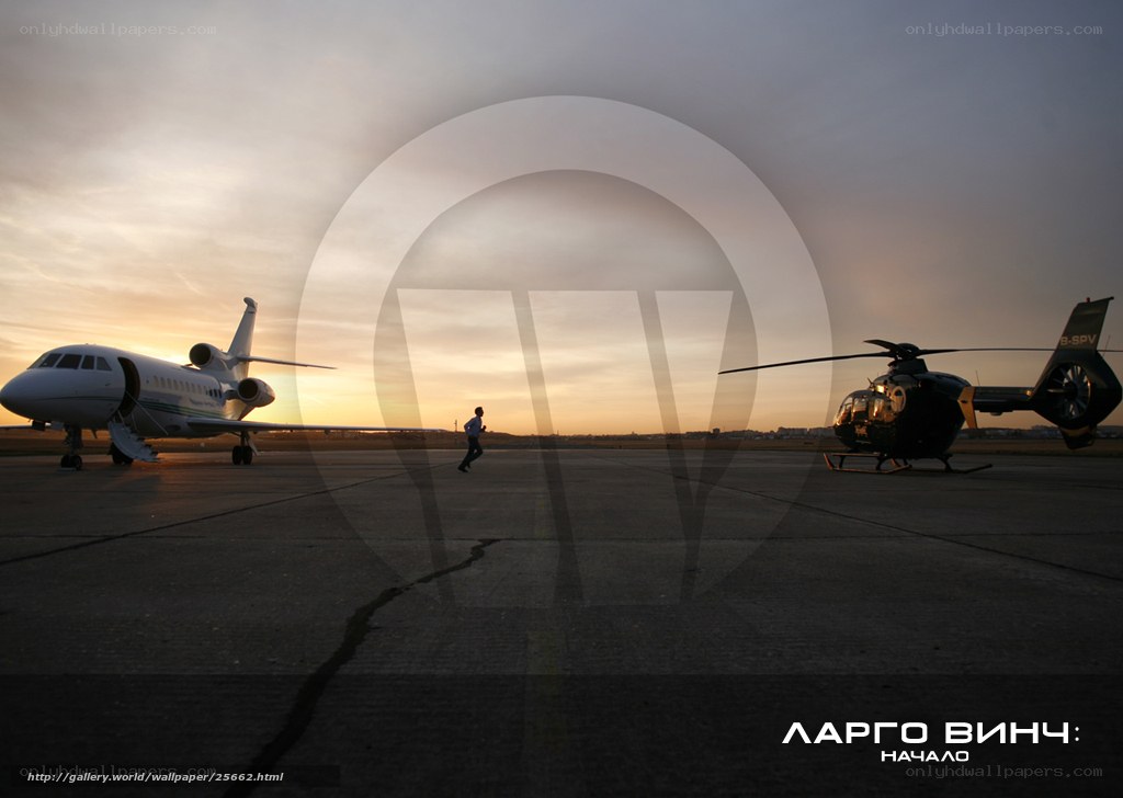 Airplane and helicopter at sunset