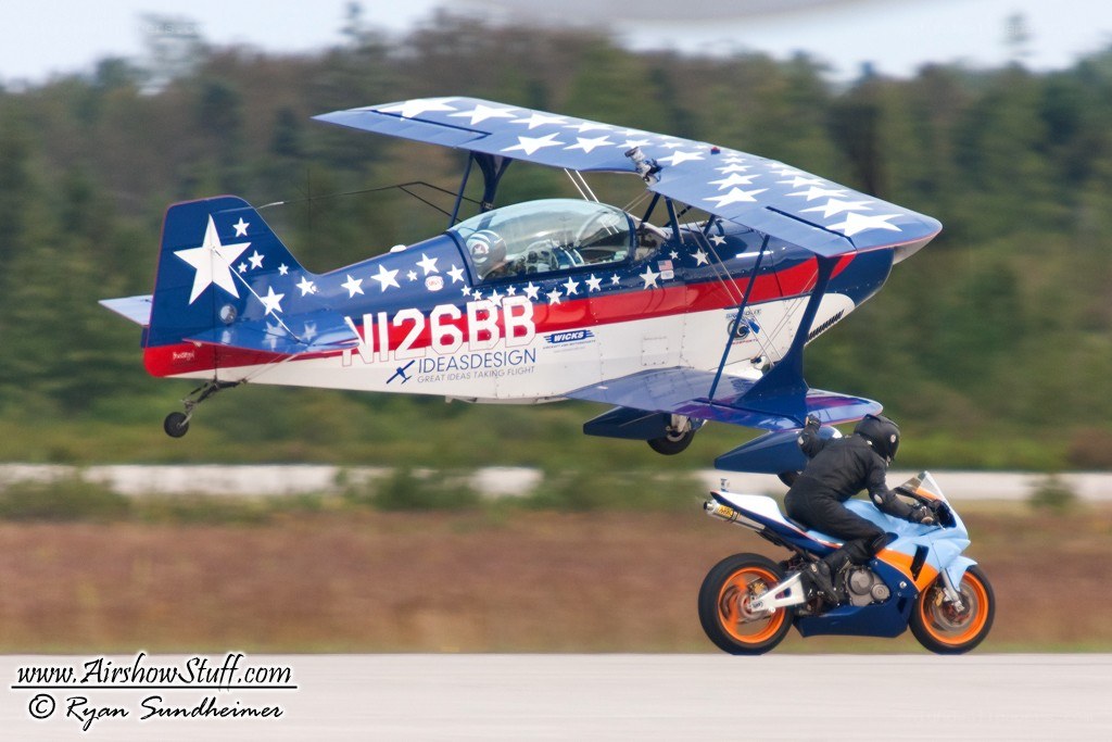 airplane and motorcycle stunt