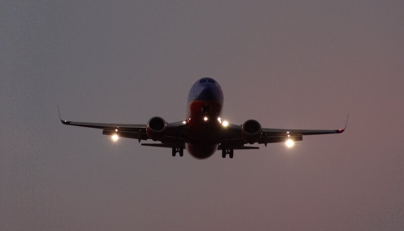 Airplane Approaching for Landing — Gray, Dramatic
