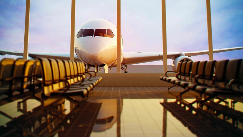 Airplane at Airport Gate — White