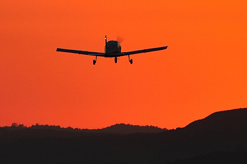 Airplane at sunset