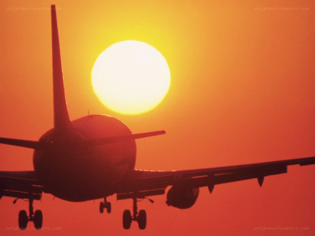 Airplane at sunset