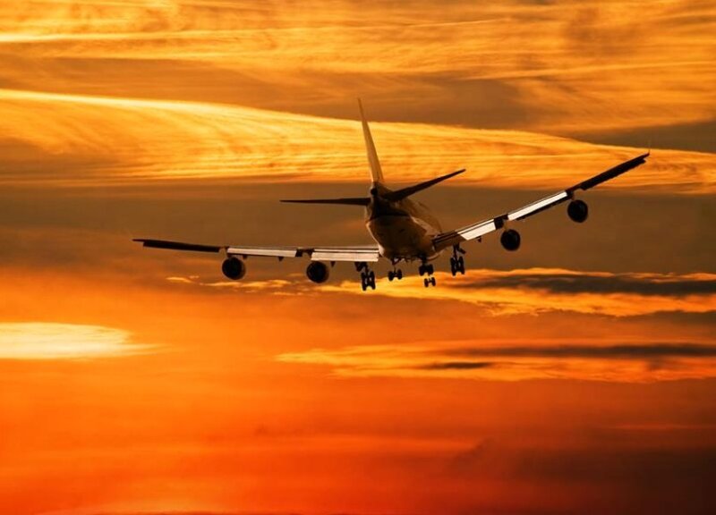 airplane at sunset
