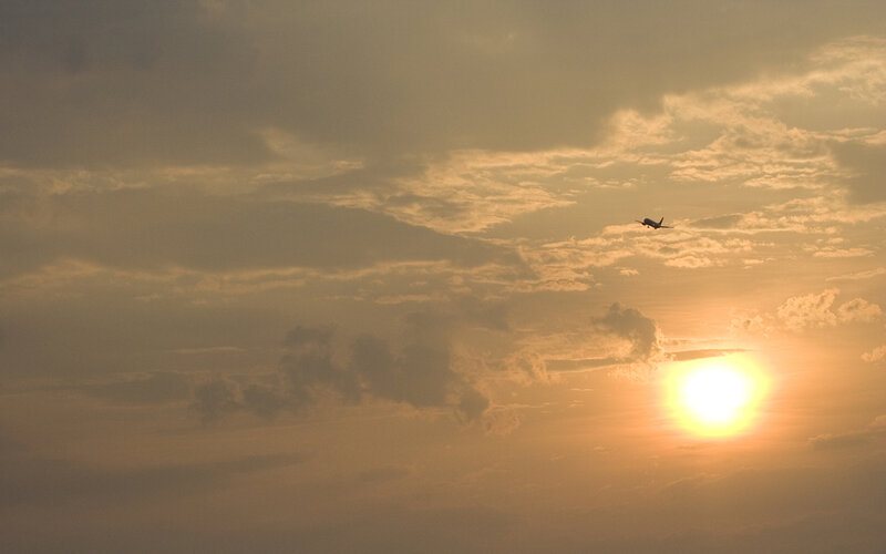 Airplane at sunset