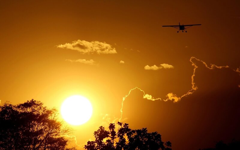 Airplane at Sunset — Orange, Dramatic, Photograph
