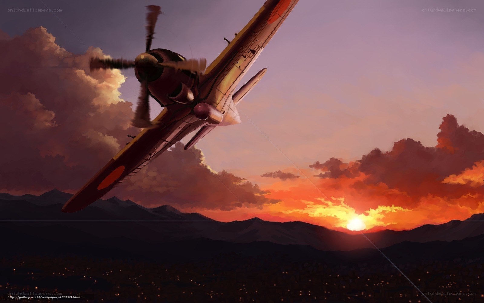 Airplane at sunset over mountains