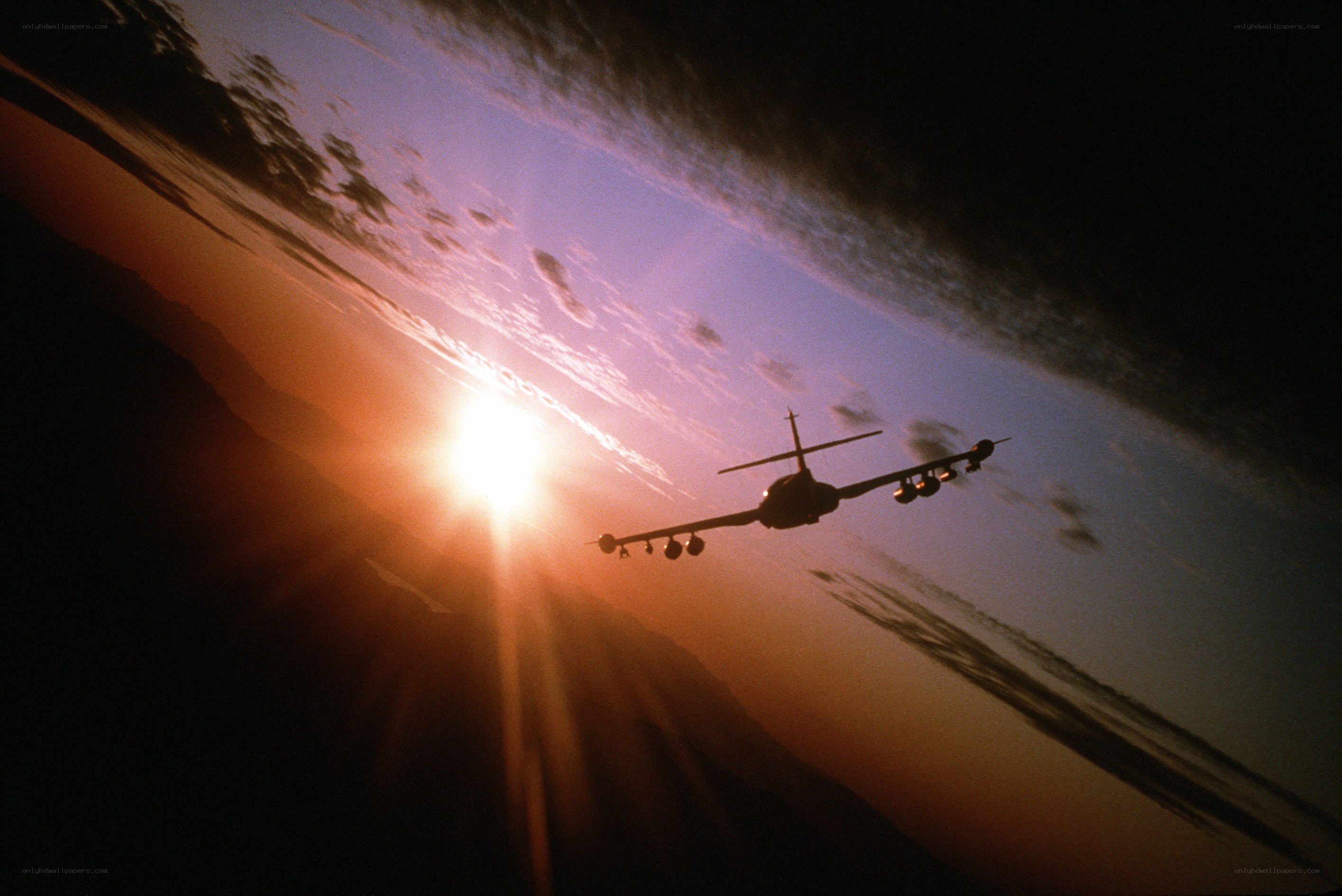 Airplane at sunset silhouette
