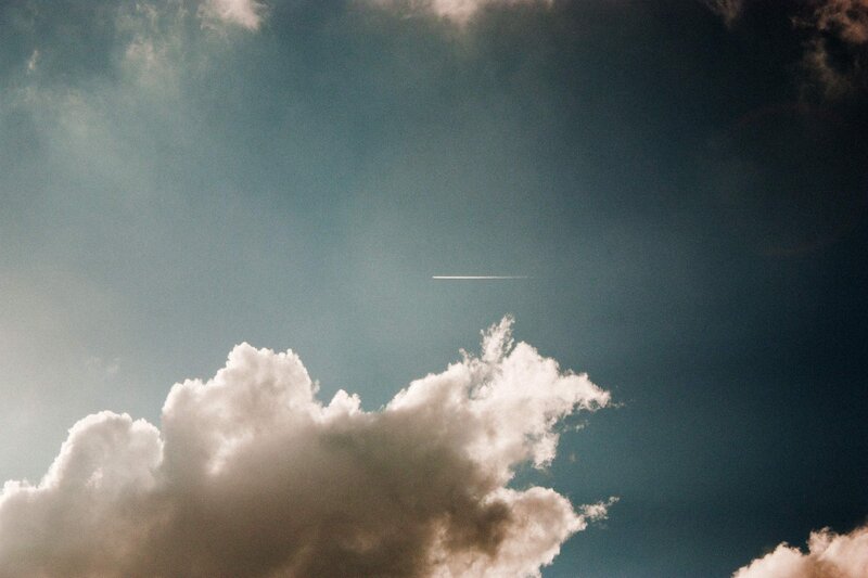 Airplane Contrail in Sky — Blue, Dramatic, Afternoon, Photograph, Clouds
