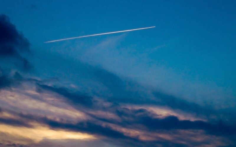 Airplane Contrail in Sky — Blue, Dramatic