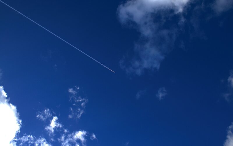 Airplane Contrail in Sky — Blue, Serene, Afternoon, Photograph, Clouds, White