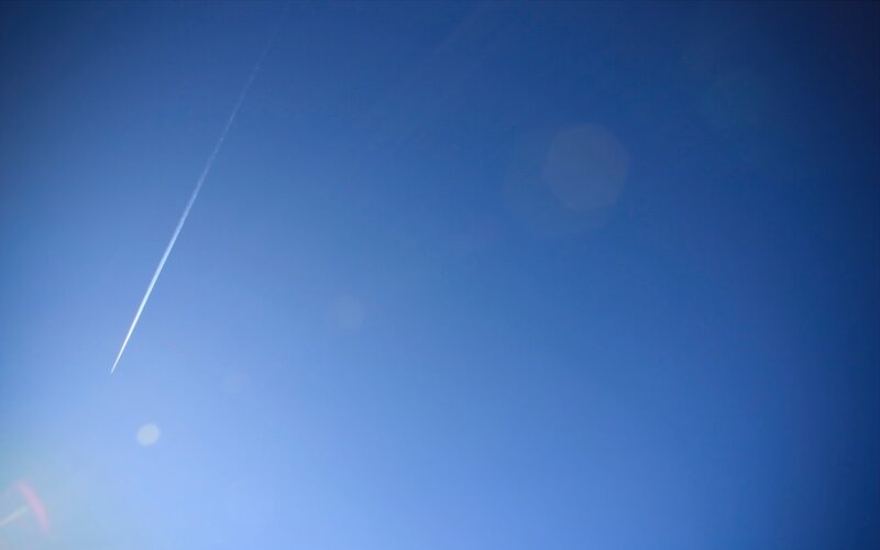 Airplane Contrail in Sky — Blue, Serene, Afternoon