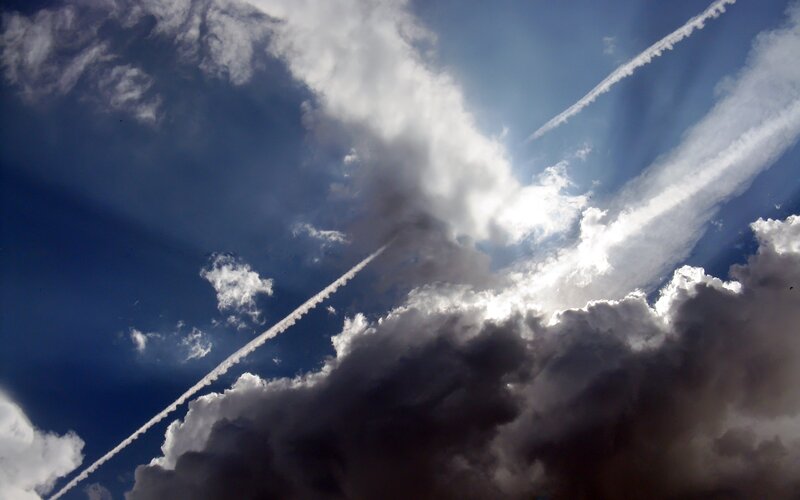 Airplane Contrails in Sky — Blue, Dramatic