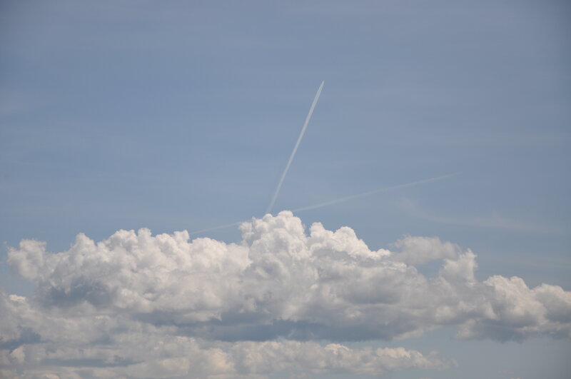 Airplane Contrails in Sky — Blue