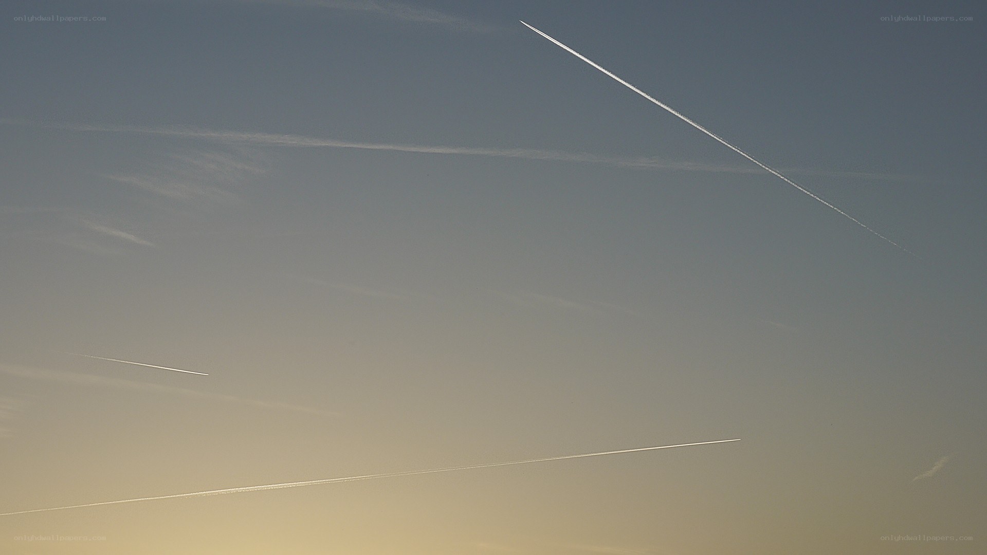 airplane contrails in the sky