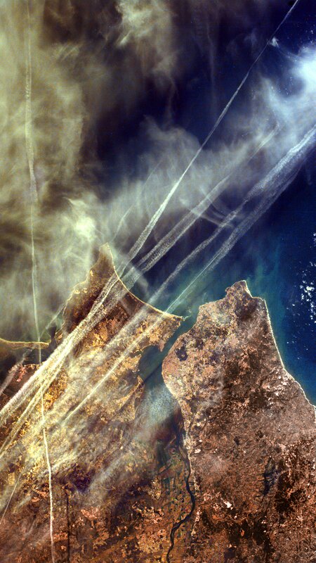 Airplane Contrails over Land