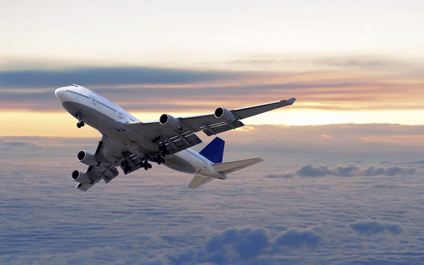 Airplane flying above clouds