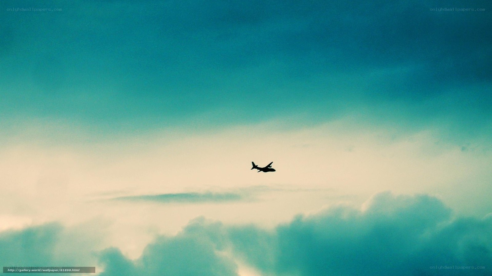 Airplane flying above clouds