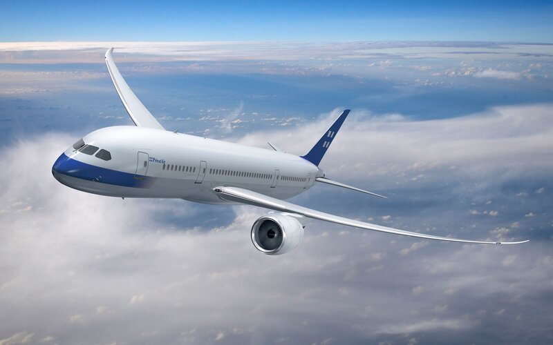 airplane flying above clouds