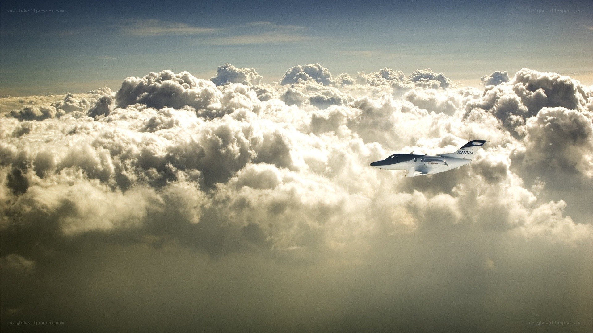 Airplane flying above clouds