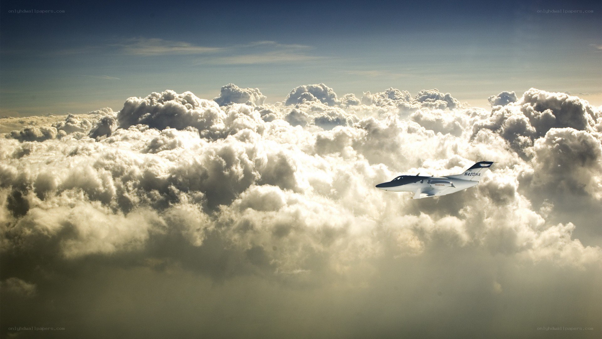Airplane flying above clouds