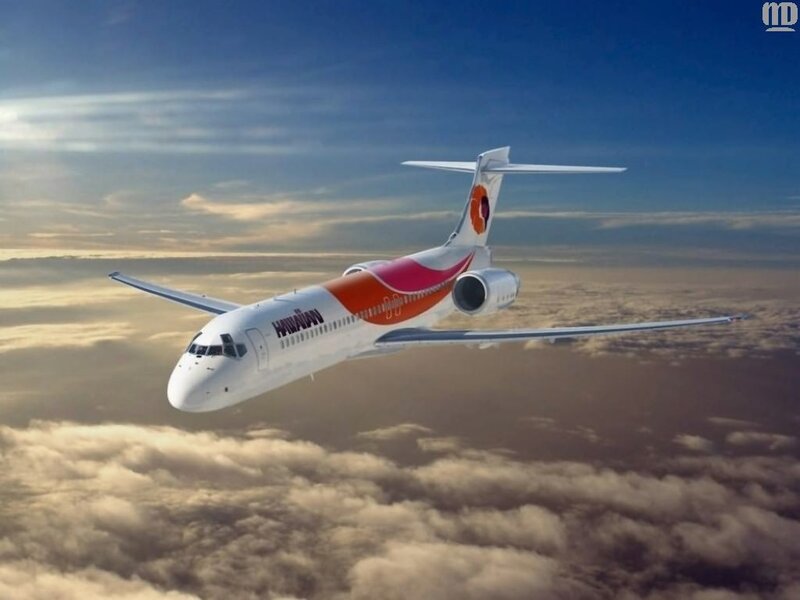 airplane flying above clouds