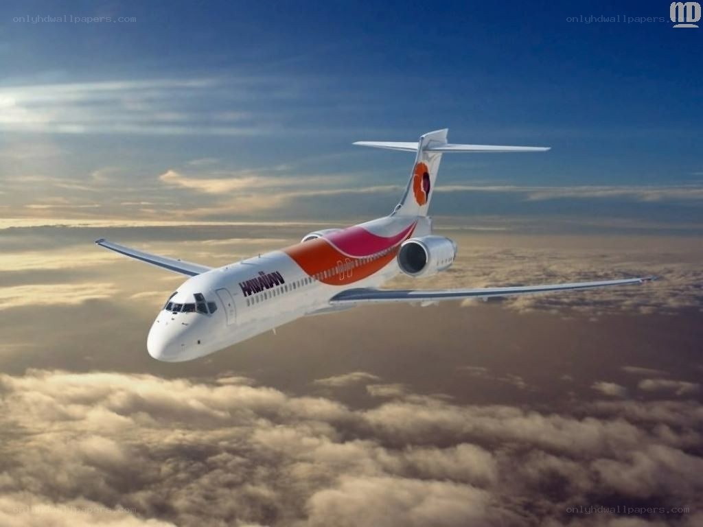 airplane flying above clouds