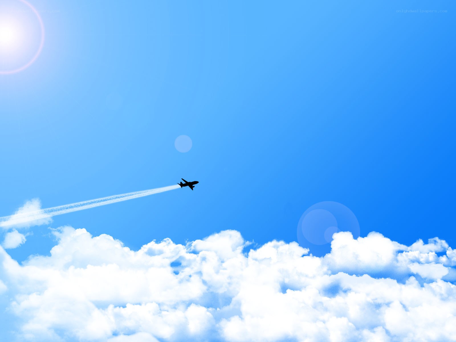 Airplane flying above clouds