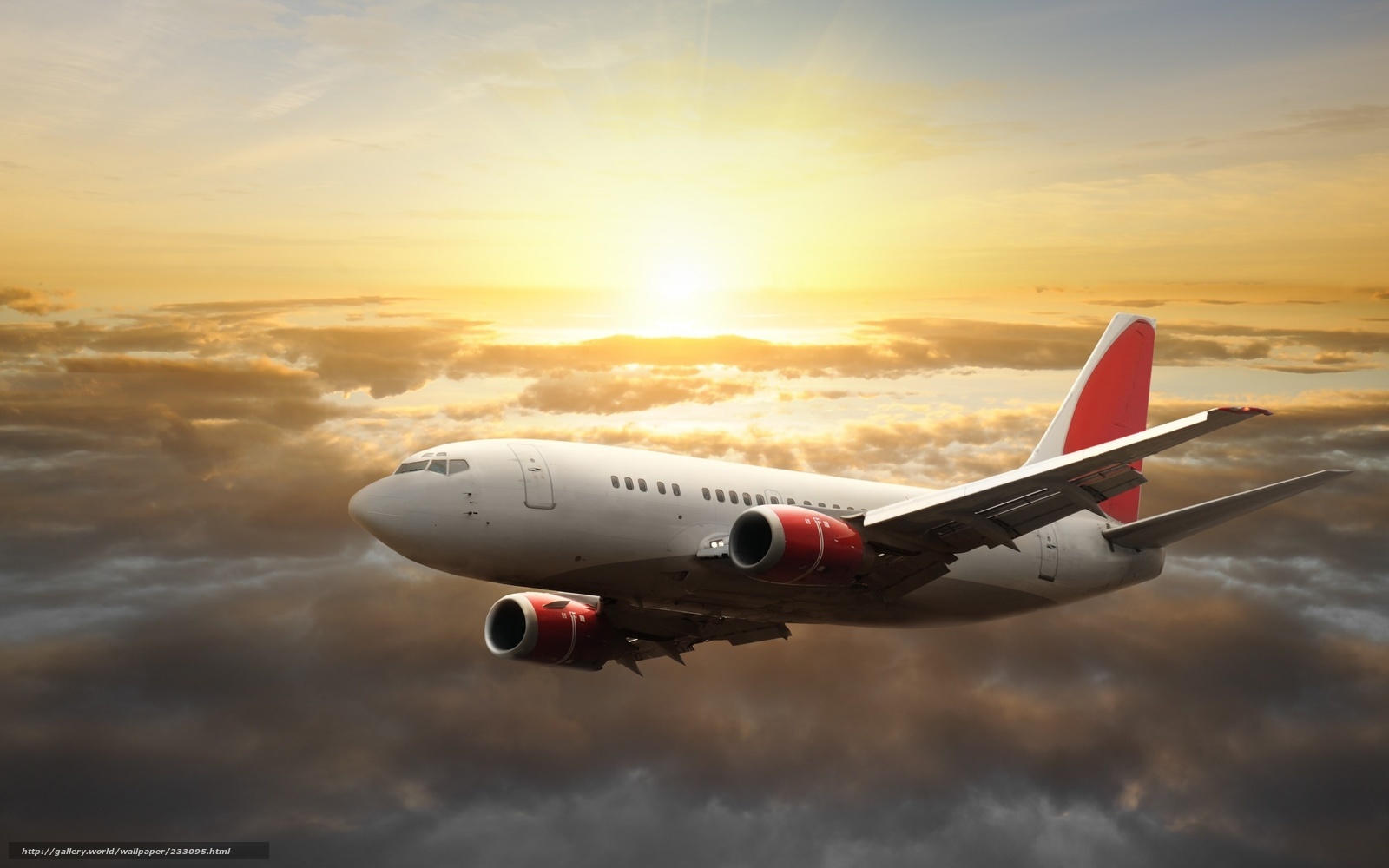 Airplane flying above clouds