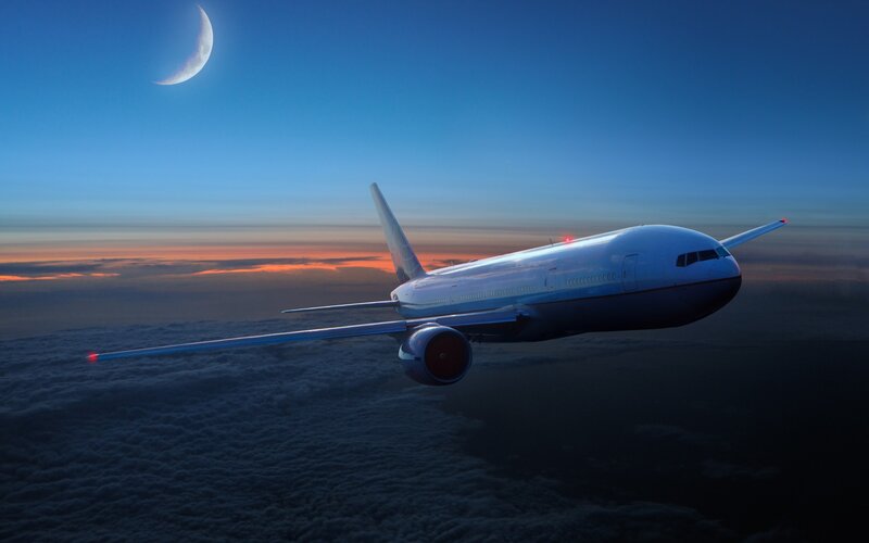 Airplane Flying Above Clouds — Blue, Serene, Night