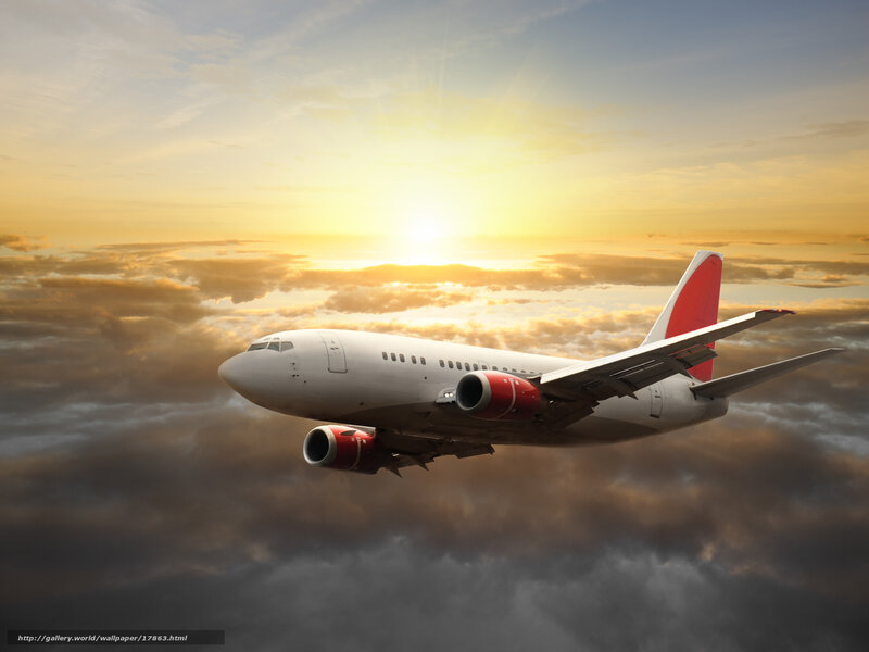 Airplane flying above clouds