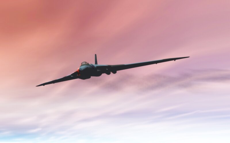 airplane flying at sunset