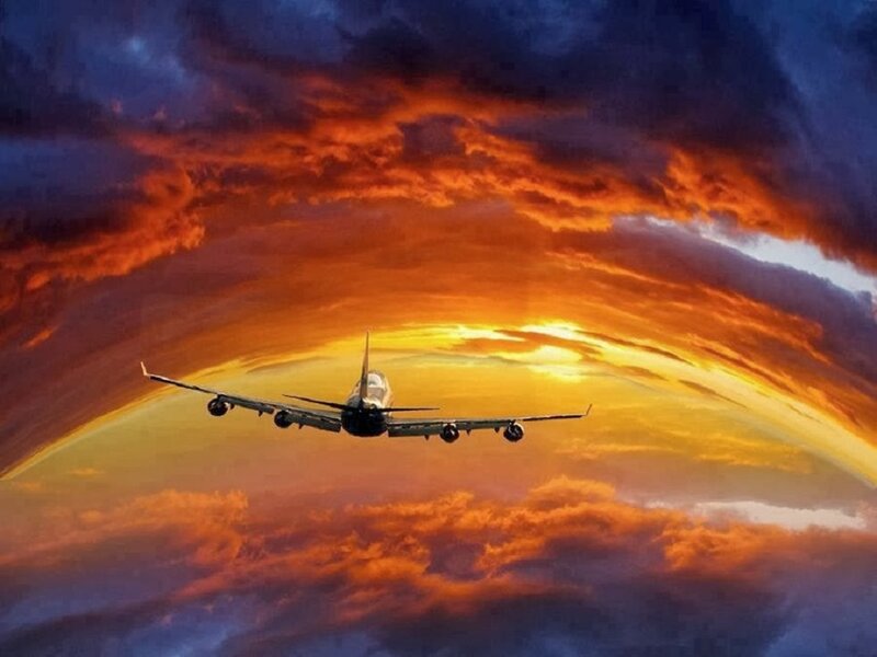 Airplane Flying at Sunset — Orange, Dramatic