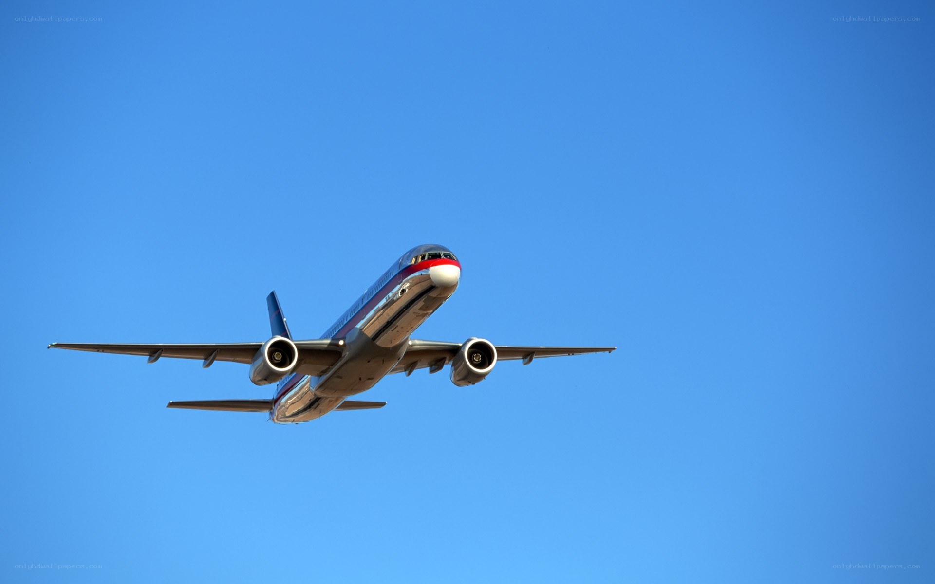 airplane flying in blue sky