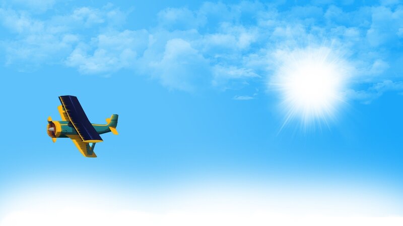 Airplane flying in sunny sky