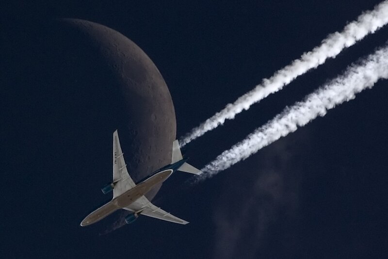 Airplane Flying Near Moon — Black