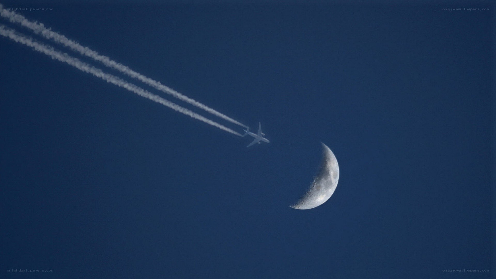 Airplane flying near the moon