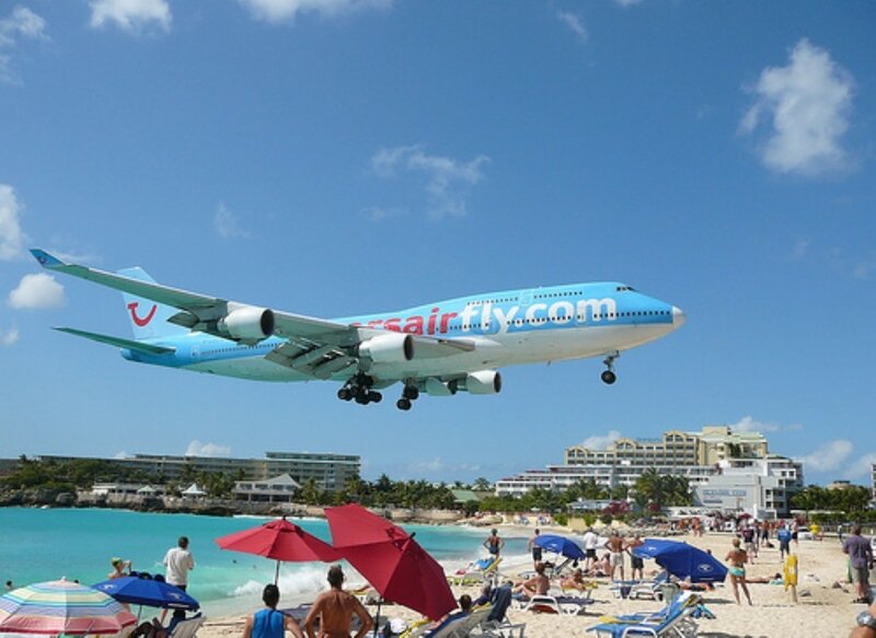Airplane Flying over Beach — Blue, Active