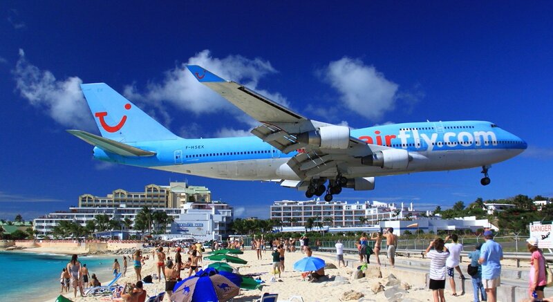 Airplane Flying over Beach — Blue, Bright