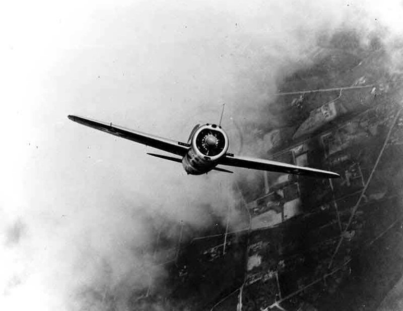 Airplane Flying over City — Black